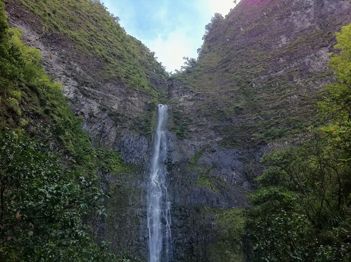Hanakapiai Falls in a narrow valley