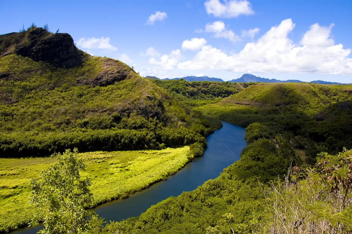 The Wailua River winding through green hills